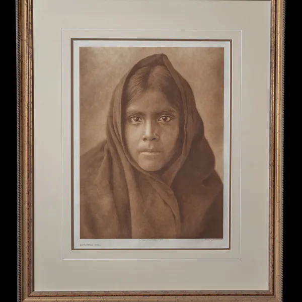 Qahatyka Girl photogravure by Edward S. Curtis, 1907 - young girl wrapped in a brown-tinted robe against a misty background