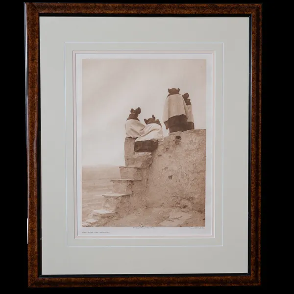 Watching the Dancers photogravure by Edward S. Curtis, 1906 - Pueblo women in ceremonial garb ascending stone steps of an adobe structure